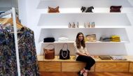 Blanca Lorca poses in Zubi store, where she has bought some of her back-to-work apparel, in Madrid, Spain, September 15, 2021. Reuters/Susana Vera