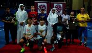 Winners of the Al Majed Open Tournament with QTSBF Secretary General Tareq Zainal and Al Majed Group’s Director of Business development Nasser Ahmed Al Majed.