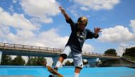 Yoshio Kinoshita practices skateboarding at a park in Daito, Osaka Prefecture, October 6, 2021. Reuters/Akira Tomoshige