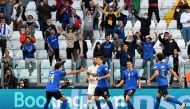 Italy's Nicolo Barella celebrates scoring their first goal with Federico Chiesa REUTERS/Massimo Pinca