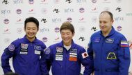 Roscosmos cosmonaut Alexander Misurkin and space flight participants Yusaku Maezawa and Yozo Hirano attend a news conference ahead of the expedition to the International Space Station, in Star City, Russia October 14, 2021. Japanese entrepreneur Yusaku Ma