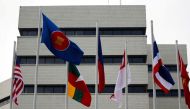Flags are seen outside the Association of Southeast Asian Nations (ASEAN) secretariat building, ahead of the ASEAN leaders' meeting in Jakarta, Indonesia, April 23, 2021. Reuters/Willy Kurniawan//File Photo