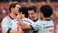 Bayern Munich's Robert Lewandowski celebrates scoring their second goal with teammates REUTERS/Thilo Schmuelgen 