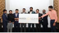 Managing Director of Al Raheeb International Group Jafar Kandoth (fourth right) unveiling the logo of Marza Hypermarket during a media briefing, in Doha, yesterday. Pic: Salim Matramkot/The Peninsula