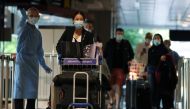 Passengers from Amsterdam arrive at Changi Airport under Singapore’s expanded Vaccinated Travel Lane (VTL) quarantine-free travel scheme in Singapore October 20, 2021. Reuters/Edgar Su