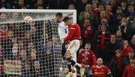 Manchester United's Cristiano Ronaldo scores their third goal REUTERS/Phil Noble
