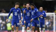  Chelsea players celebrate after the match. (REUTERS/Tony Obrien)