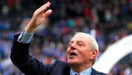 Rangers' manager Walter Smith waves to the fans after winning the Scottish Premier League after their soccer match against Kilmarnock in Scotland May 15, 2011. REUTERS/David Moir (BRITAIN - Tags: SPORT SOCCER)/File Photo