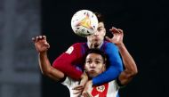 Rayo Vallecano's Radamel Falcao in action with FC Barcelona's Gerard Pique REUTERS/Sergio Perez
