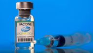 A vial labelled with the Pfizer-BioNTech coronavirus disease (COVID-19) vaccine is seen in this illustration picture taken March 19, 2021. REUTERS/Dado Ruvic/File Photo