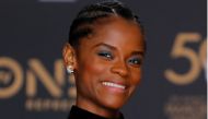 Letitia Wright poses backstage after winning the Outstanding Breakthrough Performance in a Motion Picture award for 