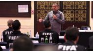 Hani Ballan speaks to participants during a FIFA Referees Workshop session.