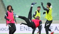 Qatar players in action during a practice session at Baku Olympic Stadium yesterday.