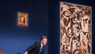 Auctioneer Oliver Barker, Chairman of Sotheby's Europe, sells a Frida Kahlo self portrait for $34.9 Million USD during an art auction, in the Manhattan borough of New York City, New York, U.S., November 16, 2021. Julian Cassady/SOTHEBY'S/Handout via REUTERS