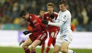 Bayern Munich's Robert Lewandowski in action with Dynamo Kyiv's Illia Zabarnyi REUTERS/Valentyn Ogirenko
