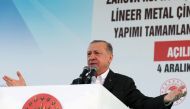 Turkish President Tayyip Erdogan addresses his supporters during a ceremony in the eastern city of Siirt, Turkey, December 4, 2021. Murat Cetinmuhurdar/Presidential Press Office/Handout via Reuters