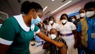 Director General of the Ghana Health Service Dr. Patrick Kuma-Aboagye receives the coronavirus disease (COVID-19) vaccine during the vaccination campaign at the Ridge Hospital in Accra, Ghana March 2, 2021. REUTERS/Francis Kokoroko/File Photo
