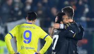 Venezia's Gianluca Busio and Marco Modolo celebrate after the match as Juventus' Alvaro Morata looks dejected REUTERS/Massimo Pinca