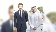 Ahmad Mohamed Zebeib (right), Deputy CEO of QLM, with David Beckham, in Doha, recently. 