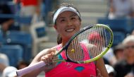 FILE PHOTO: Peng Shuai of China reacts after her victory over Belinda Bencic of Switzerland in their quarterfinals match at the 2014 U.S. Open tennis tournament in New York, U.S. September 2, 2014. REUTERS/Adam Hunger/File Photo

