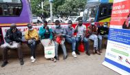 Civilians queue to receive the coronavirus disease (COVID-19) vaccine at a makeshift tent as the government orders for proof of vaccination to access public places and transport, in downtown Nairobi, Kenya December 23, 2021. REUTERS/Monicah Mwangi
