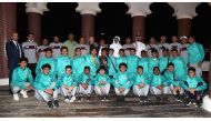 QFA President Sheikh Hamad bin Khalifa bin Ahmed Al Thani poses for a photo with Yemen U-15 squad.