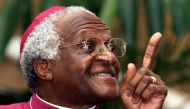File photo of Archbishop Desmond Tutu as he makes a point addressing a meeting March 16, 2001 to raise awareness for World Tuberculosis Day. Reuters/Mike Hutchings/File Photo