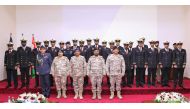 Chief of Staff of the Armed Forces H E Staff Lieutenant General (Pilot) Salem bin Hamad bin Mohammed bin Aqeel Al Nabit and other officers with participants of training courses arranged by the Amiri Naval Forces. 