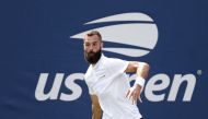 Benoit Paire (FRA) hits a shot to Dusan Lajovic (SRB) in a first round match on day one of the 2021 U.S. Open tennis tournament at USTA Billie King National Tennis Center. Aug 30, 2021; Flushing, NY, USA; Mandatory Credit: Jerry Lai-USA TODAY Sports

