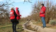 QRCS representatives at an irrigation rehabilitation network site. 