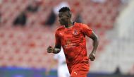 Al Duhail's Michael Olunga celebrates after scoring a goal.
