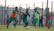 Al Ahli players in action during a training session.