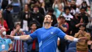 Britain's Andy Murray celebrates winning his first round match against Georgia's Nikoloz Basilashvili REUTERS/James Gourley