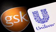 Smartphone with displayed Unilever logo is pictured next to GSK logo in this illustration taken on January 17, 2022. REUTERS/Dado Ruvic/Illustration
