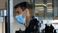 FILE PHOTO: Serbian tennis player Novak Djokovic arrives at Nikola Tesla Airport, after the Australian Federal Court upheld a government decision to cancel his visa to play in the Australian Open, in Belgrade, Serbia January 17, 2022. REUTERS/Christopher Pike 