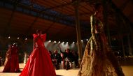 Models present creations by designer Elie Saab as part of his Haute Couture Spring/Summer 2022 collection show in Paris, France, January 26, 2022. REUTERS/Violeta Santos Moura

