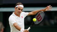 FILE PHOTO: Tennis - Wimbledon - All England Lawn Tennis and Croquet Club, London, Britain - July 5, 2021 Switzerland's Roger Federer in action. REUTERS/Paul Childs/File Photo
