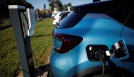 A Renault wallbox is used by a Renault Captur hybrid car at a dealership in Les Sorinieres, near Nantes, France, October 23, 2020. Reuters/Stephane Mahe/File Photo