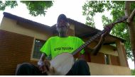 Malawian musician Giddes Chalamanda plays his song Linny Hoo, at his home in Chiradzulu village, January 28, 2022. Reuters/Eldson Chagara