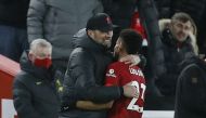 Liverpool's Luis Diaz with manager Juergen Klopp after being substituted REUTERS/Craig Brough