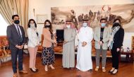 QRCS Secretary-General Ali bin Hassan Al Hammadi with a delegation from the embassy of the United States in Doha.