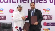 QTSBF President Nasser bin Ghanim Al Khelaifi and TotalEnergies EP Qatar Managing Director & Country Chair Matthieu Bouyer shake hands during the agreement signing ceremony.