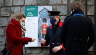 Tourists visit Windsor Castle, after it was announced that Britain's Queen Elizabeth tested positive for the coronavirus disease (COVID-19), in Windsor, Britain February 21, 2022. REUTERS/Peter Nicholls