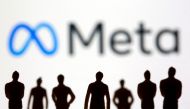 FILE PHOTO: Small toy figures are seen in front of displayed Facebook's new rebrand logo Meta in this illustration taken, October 28, 2021. REUTERS/Dado Ruvic/Illustration/File Photo
