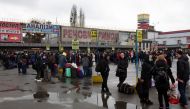 People gather at a bus station as they try to leave the city of Kyiv, Ukraine February 24, 2022. REUTERS/Volodymyr Petrov


