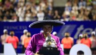 February 26, 2022 Spain's Rafael Nadal celebrates with the trophy after winning the final REUTERS/Henry Romero
