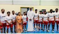 The chief guest, former Al Rayyan basketball star Yaseen Ismail with the coaches and officials of New Vision Badminton Sport.