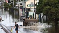 A view of a flooded road following heavy rains in Lismore, New South Wales, Australia March 2, 2022. AAP Image/Jason O'Brien via REUTERS 