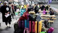 A pile of luggage is placed as volunteers wait for people to arrive at Berlin's central train station, following Russia's invasion of Ukraine, in Berlin, Germany, March 2, 2022. REUTERS/Hannibal Hanschke
