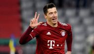 Bayern Munich's Robert Lewandowski celebrates scoring their third goal to complete his hat-trick REUTERS/Andreas Gebert
